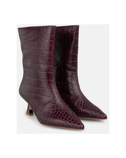 Alma En Pena. Brown Heeled Boots