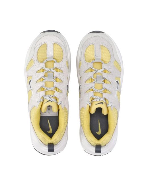 Nike White Tech hera low sneaker in saturn gold
