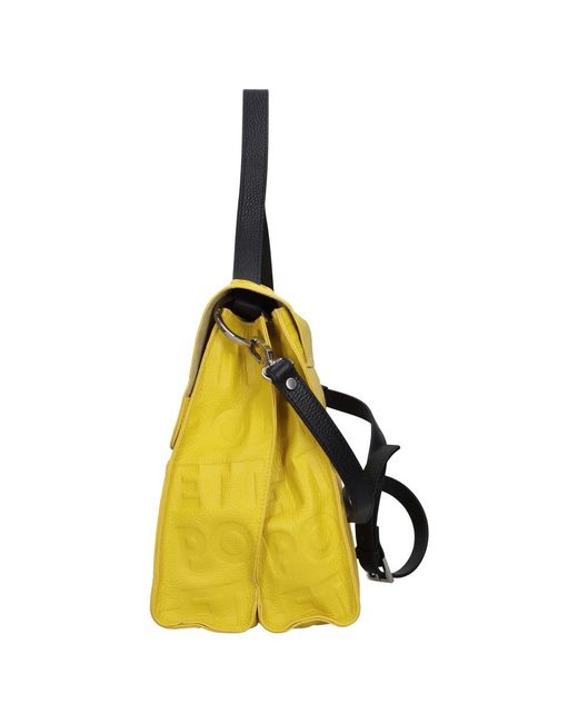 Handbags di Rebelle in Yellow