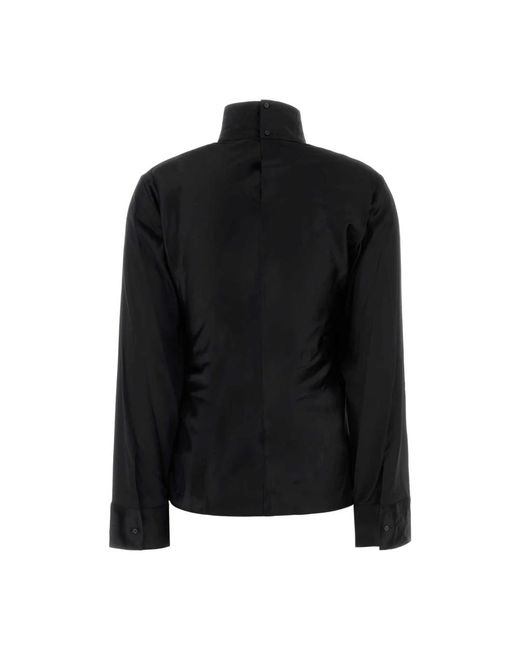 Blouses Courreges de color Black
