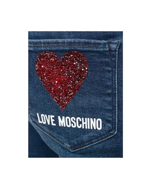 Love Moschino Blue Niedrig sitzende blaue bootcut-jeans mit diamantverzierungen