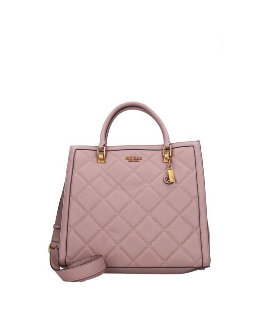 Handbags di Guess in Pink