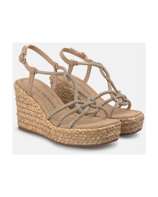 Alma En Pena. Metallic Wedges