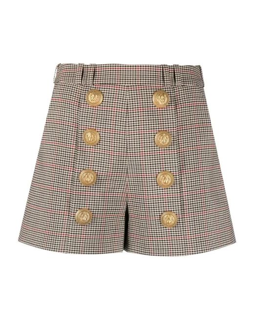Shorts de lana con botones dorados y cintura alta Balmain de color Brown