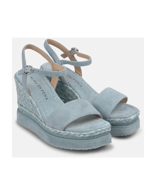 Alma En Pena. Blue Wedges