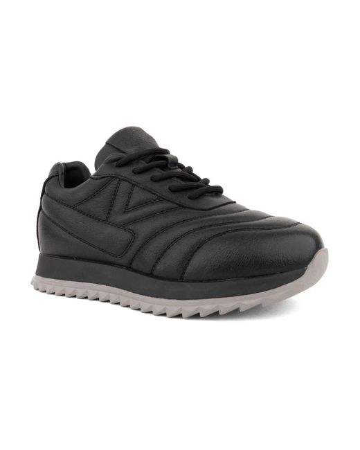Linda Baumann Black Sneakers