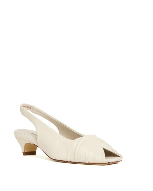 Halmanera White Pumps