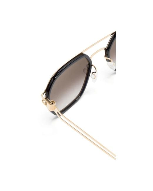 Mykita Metallic Stylische sonnenbrille in glänzendem gold schwarz