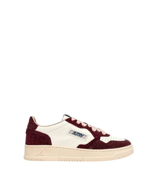 Sneakers di Autry in Pink