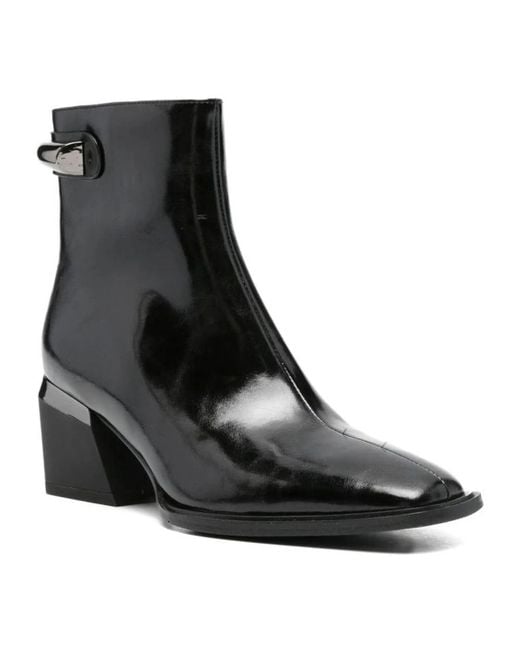 Linda Baumann Black Heeled Boots