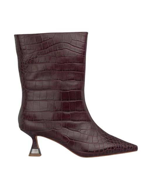 Alma En Pena. Brown Heeled Boots