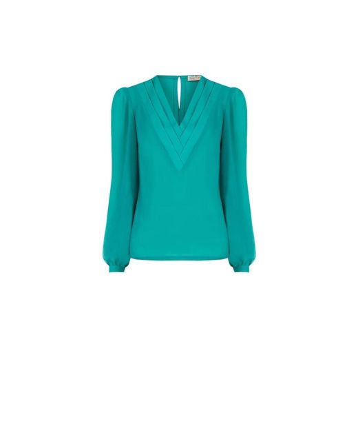 Blusa de georgette con escote en v - primavera-verano 2024 Rinascimento de color Blue