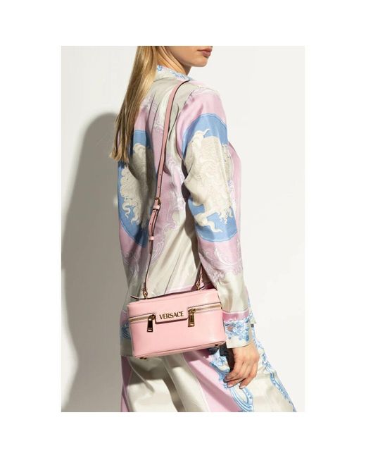 Handbags Versace de color Pink