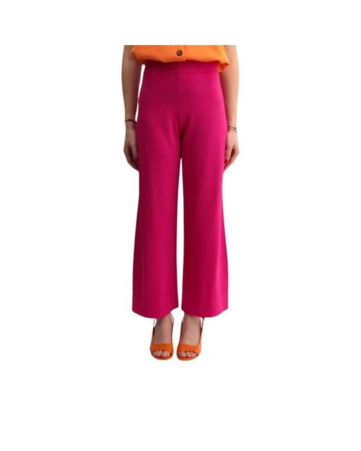 Pantalones fucsia con cintura elástica Liviana Conti de color Red