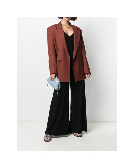 Norma Kamali Black Jumpsuits