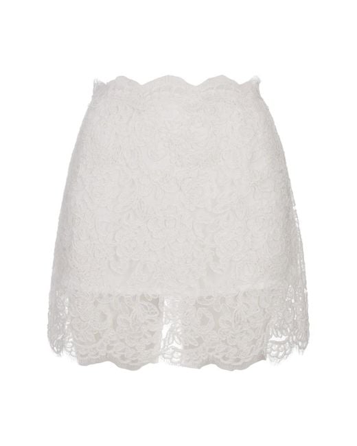 Short skirts Ermanno Scervino de color White