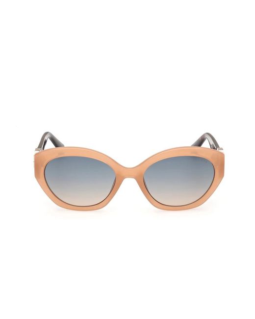 Guess Blue Klassische ovale sonnenbrille mit strass-logo