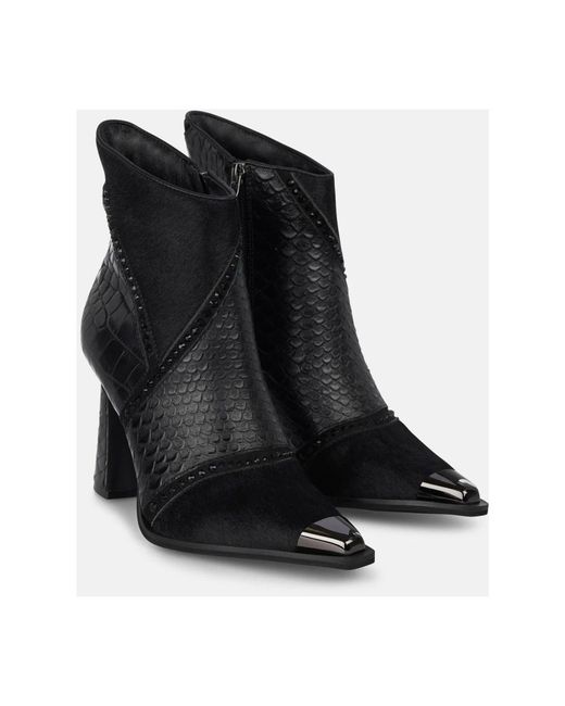 Alma En Pena. Black Heeled Boots