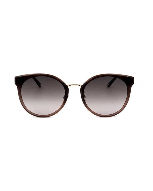 Sunglasses di Swarovski in Brown