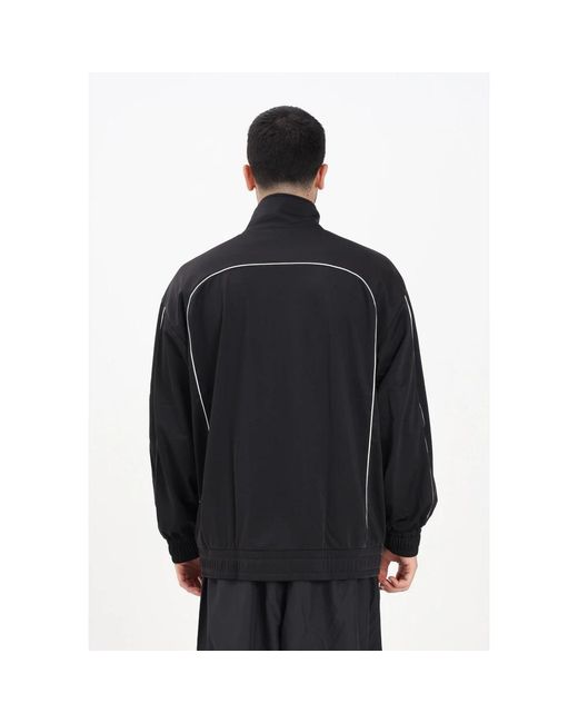 PUMA Jassen ,Zwart ,Polyester Zwarte Windjack Streetwear Collectie in het Black voor heren