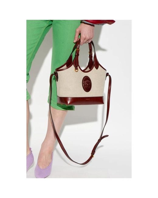 Handbags di Versace in Brown