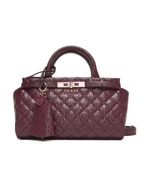 Handbags di Guess in Purple