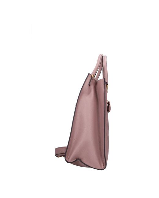 Handbags di Guess in Pink