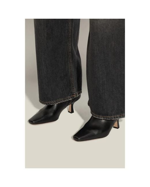Heeled Boots di COACH in Black