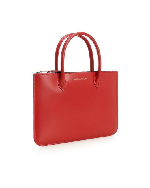 Comme des Garçons Red Handbags