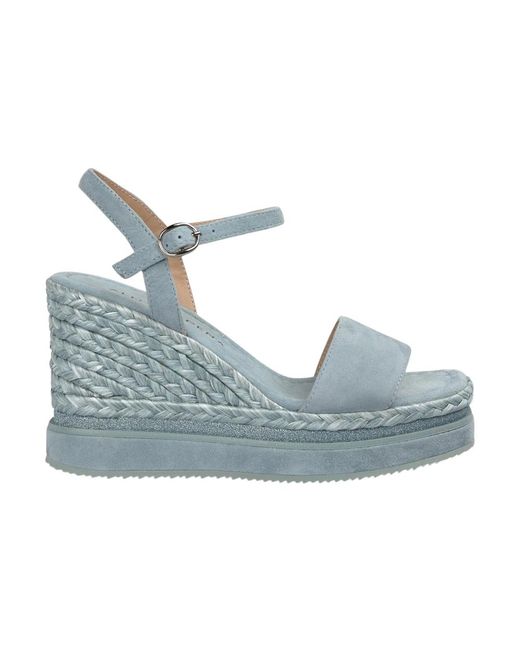 Alma En Pena. Blue Wedges