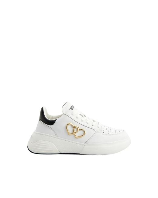 Sneakers bianche con dettagli a cuore di Love Moschino in White