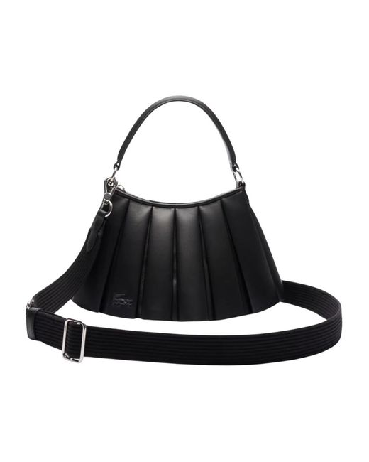 Handbags Lacoste de color Black