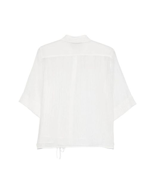 Seventy White Shirts