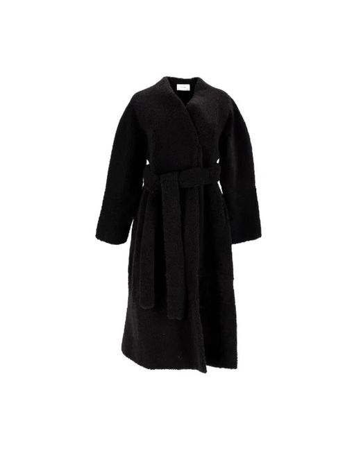 The Row Black Belted Coats