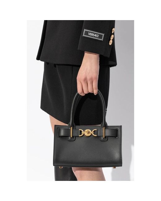 Handbags di Versace in Black
