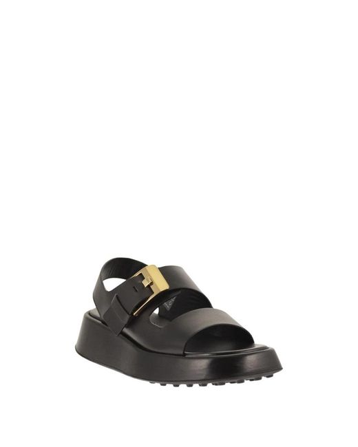 Tod's Black Flat Sandals