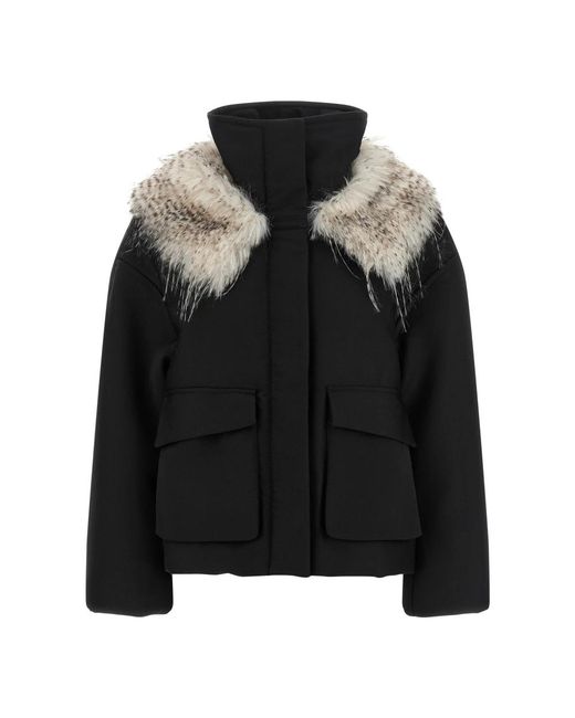 Winter Jackets Tela en coloris Black