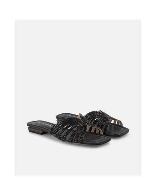 Alma En Pena. Brown Sliders
