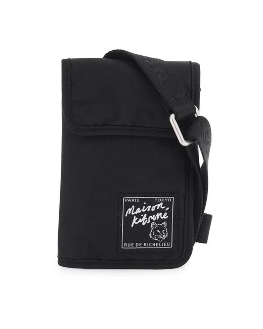 Maison Kitsuné Cross body bags in Black für Herren