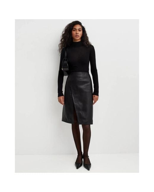 Loulou de Saison Black Leather Skirts