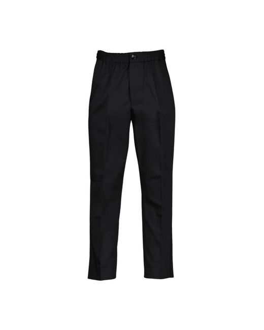 Trousers > slim-fit trousers AMI pour homme en coloris Black