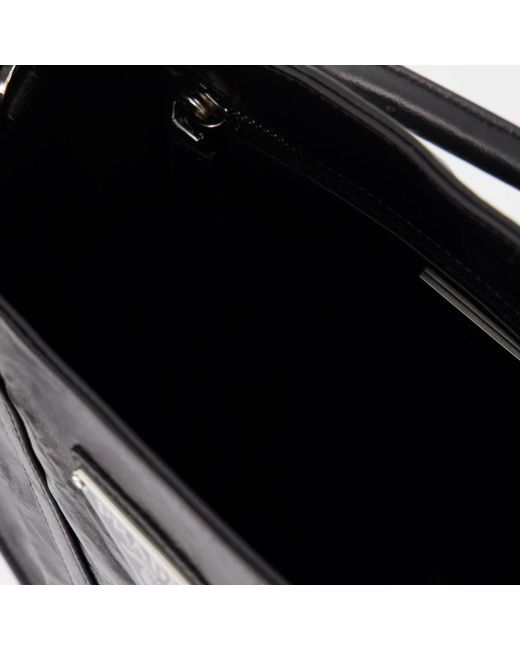 Prada Black Handtasche mit verstellbarem riemen und metall-logo