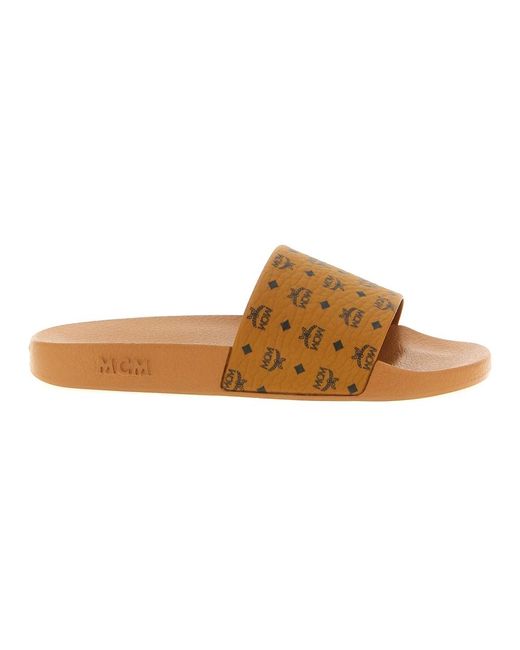 MCM Schoenen ,Bruin ,Monogram Print Rubber Slides in het Brown