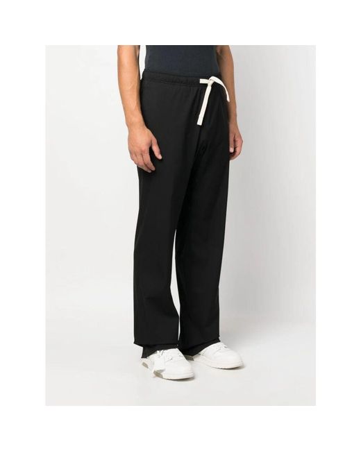 Pantaloni da viaggio monogram con dettagli intelligenti di Palm Angels in Black da Uomo