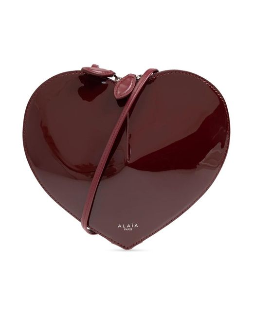 Alaïa Red Cross Body Bags