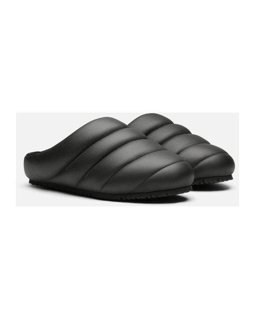 Axel Arigato Black Mules