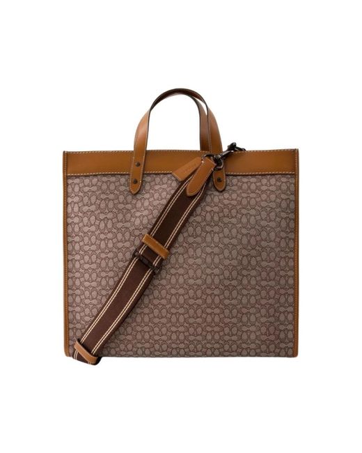 COACH Brown Handbags for men