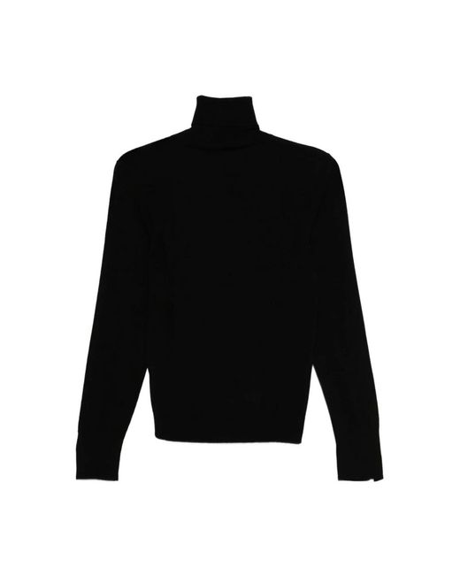 Seventy Black Turtlenecks