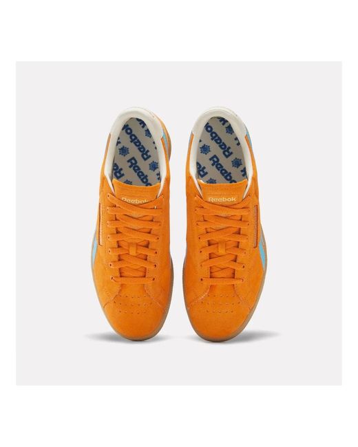 Reebok Club grounds sneakers in Orange für Herren