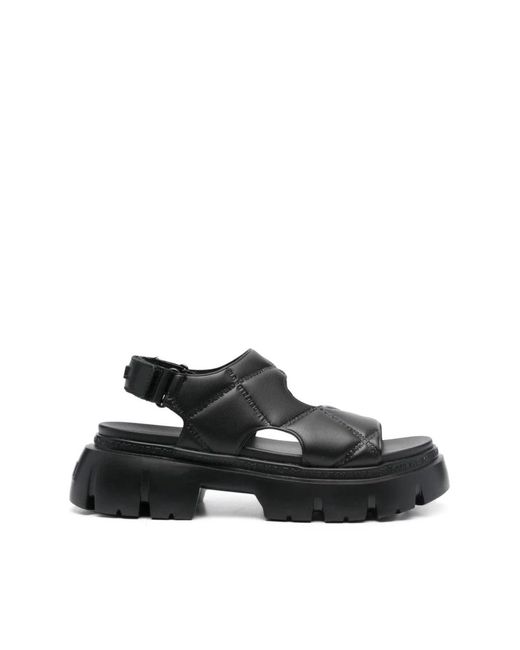 Sandales matelassées à logo embossé Karl Lagerfeld en coloris Black